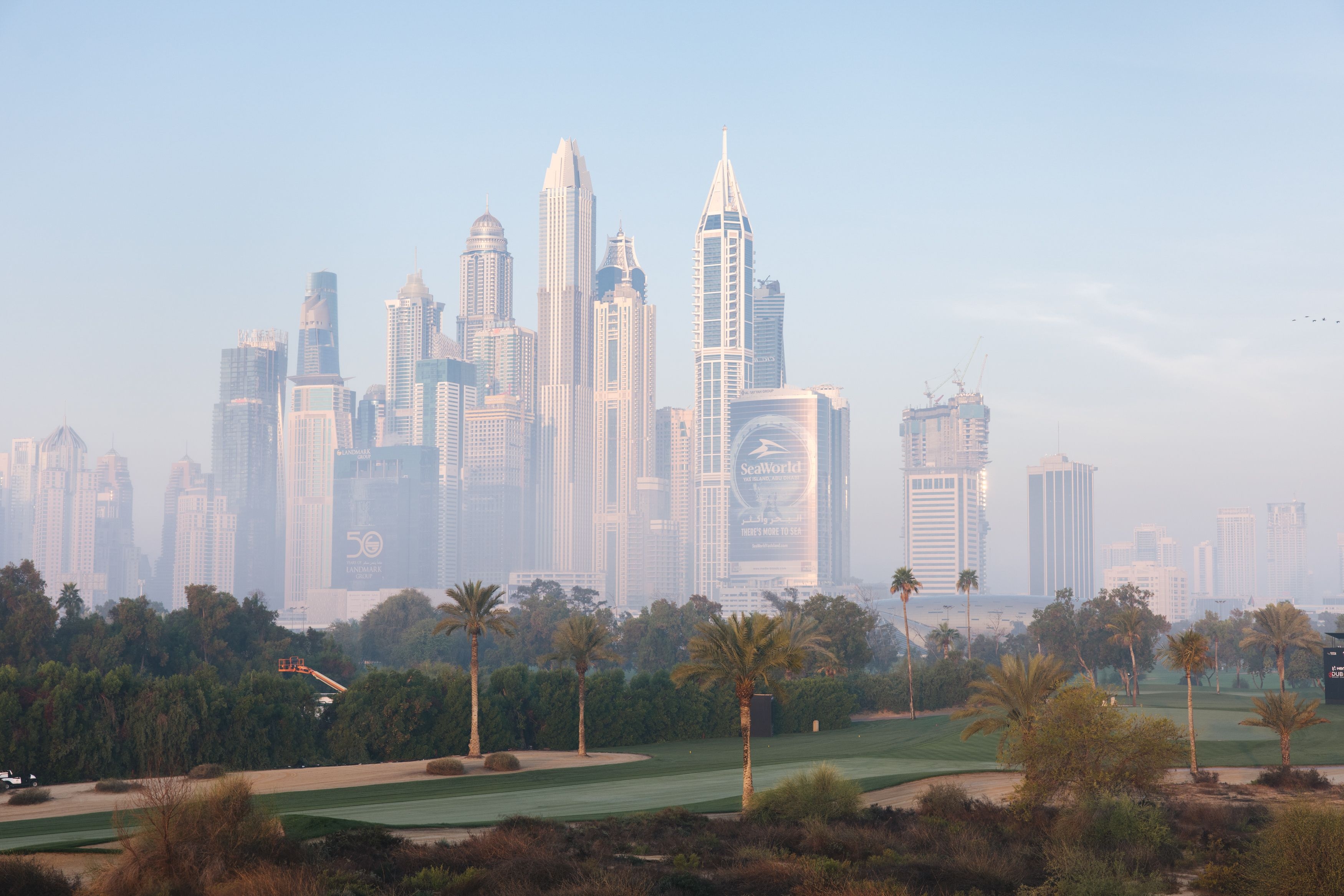 View of Dubai’s Majilis area with modern architecture and cityscape under a clear sky